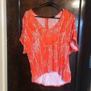 Orange loose fit high-low top